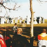 Vintage photo of Carhenge with patrons visiting.